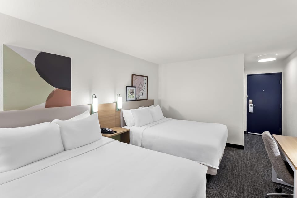 Room, 2 Queen Beds | Iron/ironing board, free cribs/infant beds, free WiFi, bed sheets