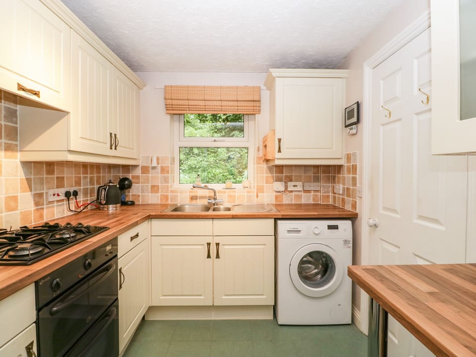 Fridge, electric kettle, toaster, cookware/dishes/utensils