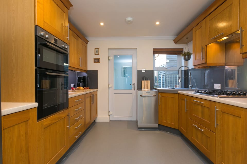 Fridge, electric kettle, toaster, cookware/dishes/utensils