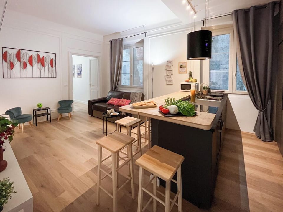 Family Apartment | Living area | 55-inch flat-screen TV with cable channels, TV, toys