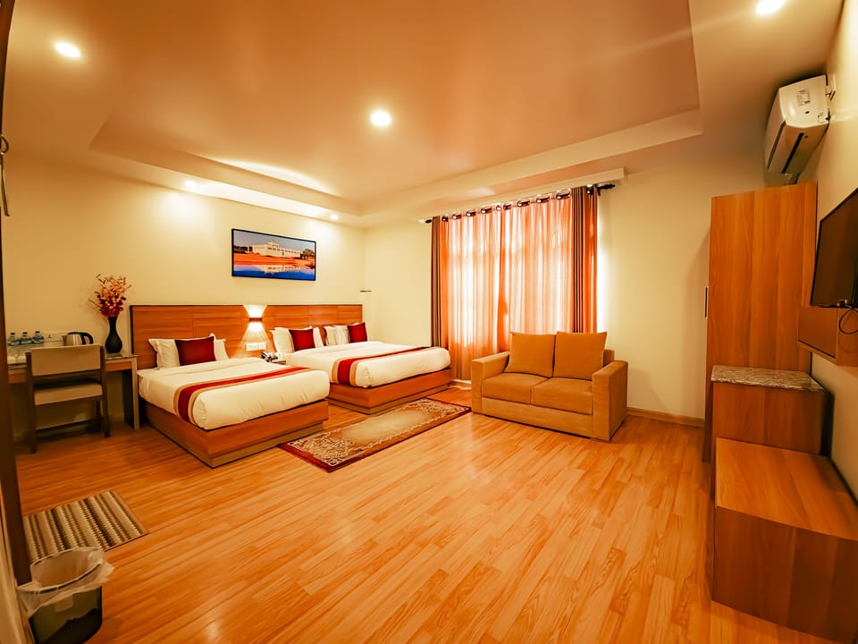 Family Room, Multiple Beds | Minibar, desk, laptop workspace, soundproofing