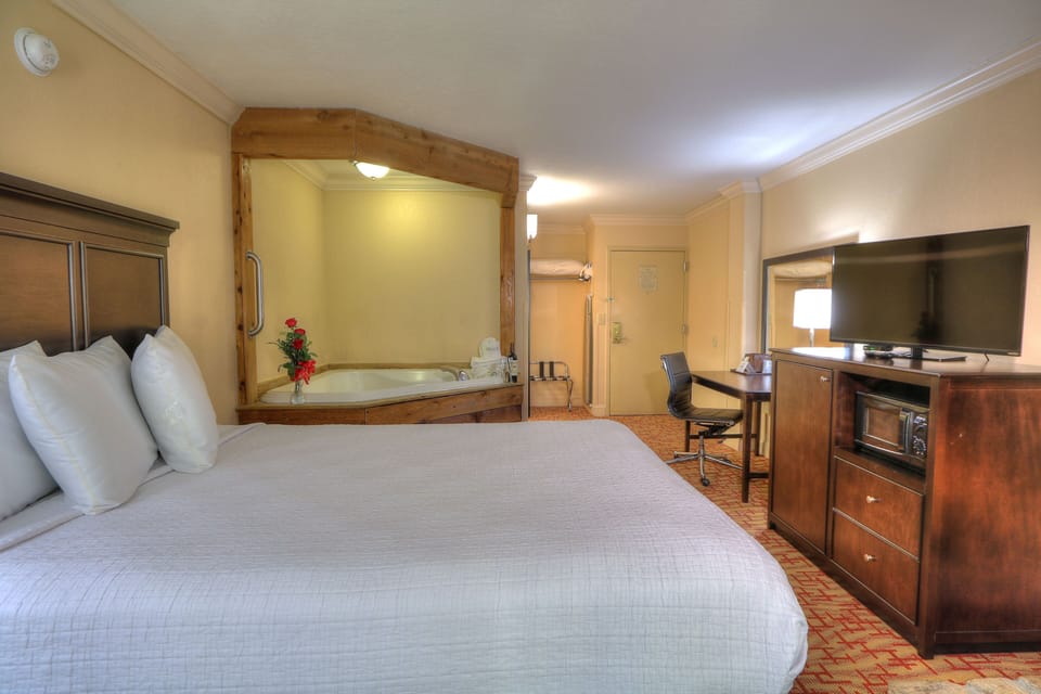 Romantic Room, 1 Queen Bed, Jetted Tub | Desk, iron/ironing board, free WiFi, bed sheets
