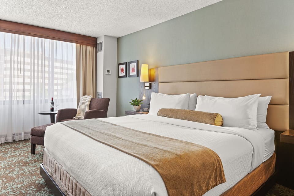 Premium bedding, down comforters, in-room safe, desk