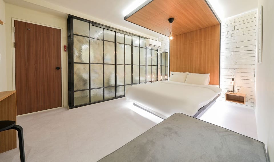 Family Triple Room | Free minibar, desk, free WiFi, bed sheets