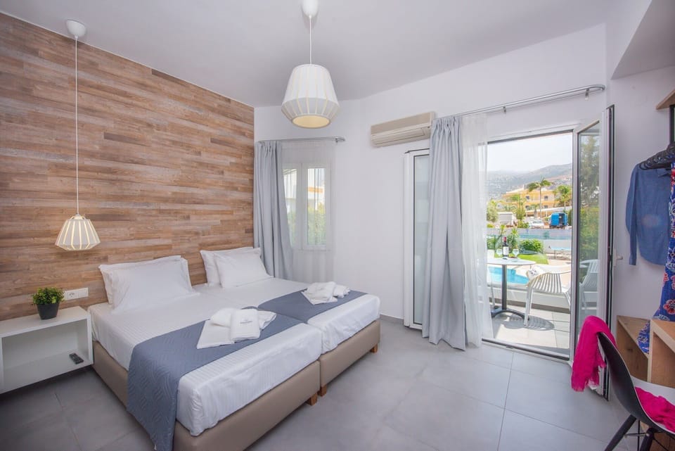 Superior Studio, Pool View | In-room safe, desk, iron/ironing board, free WiFi