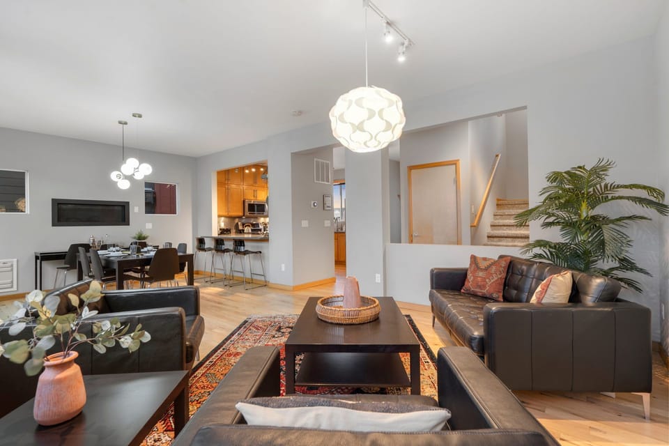 House, Multiple Beds, Hot Tub, Garden View (369 Osiander St) | Living area | 75-inch flat-screen TV with cable channels, TV, fireplace