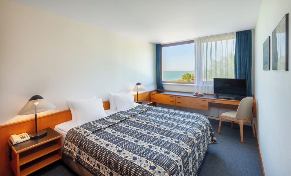 Minibar, desk, blackout drapes, free WiFi