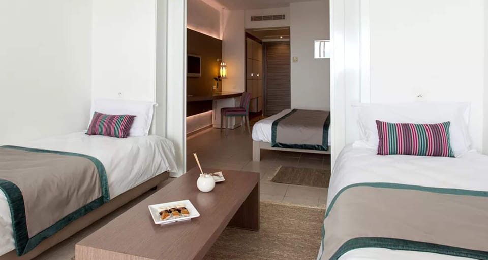 Superior Quadruple Room, Private Bathroom, Sea View | Premium bedding, minibar, in-room safe, free WiFi