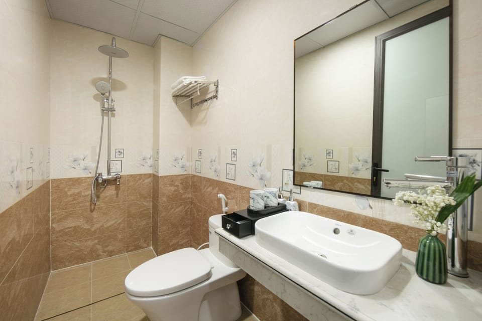 Hair dryer, bidet, towels, soap