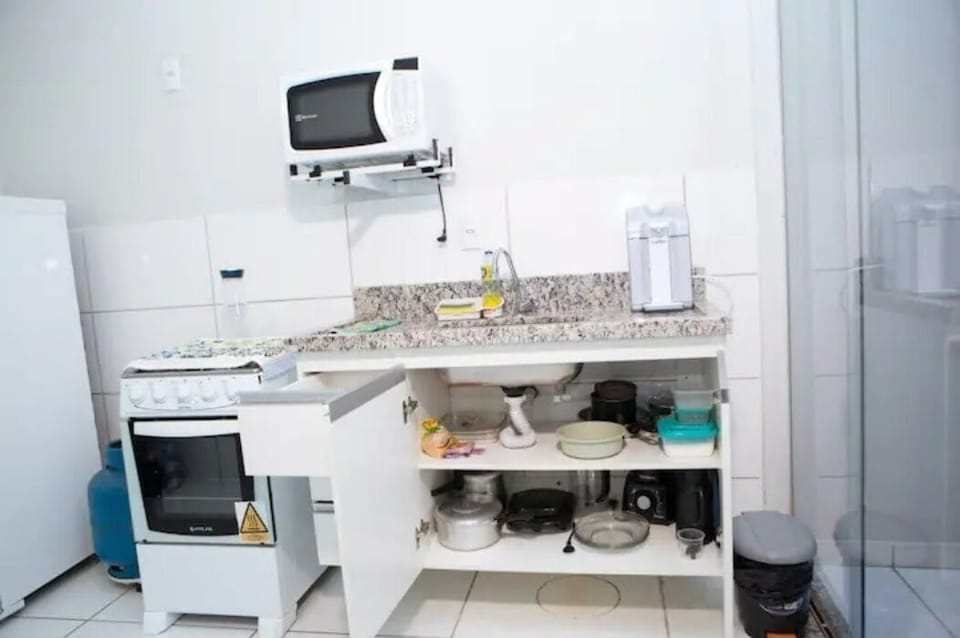 Microwave, blender, cookware/dishes/utensils