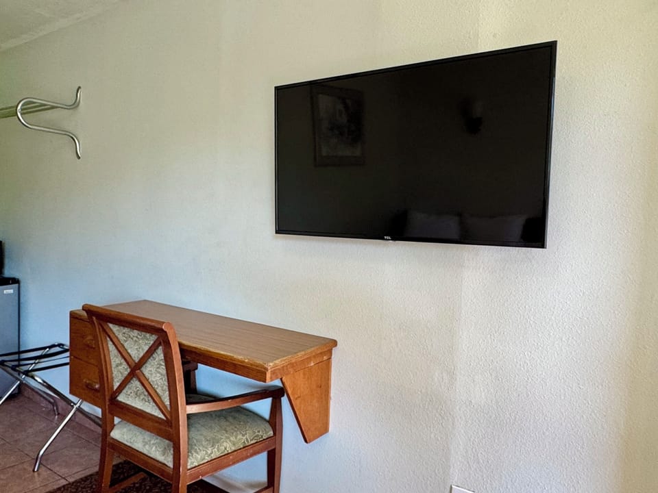 Desk, blackout drapes, WiFi (free), alarm clocks