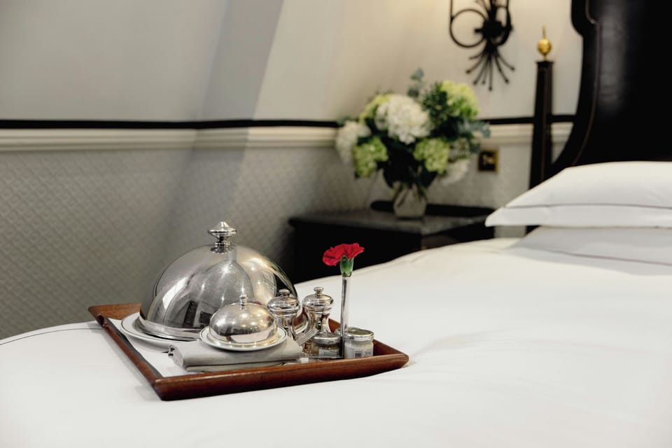 Executive Suite | Premium bedding, minibar, in-room safe, individually decorated