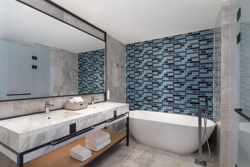 Shower, rainfall showerhead, free toiletries, hair dryer