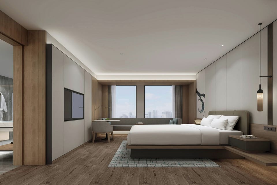 Deluxe Room, 1 King Bed, City View | Premium bedding, down comforters, in-room safe, desk