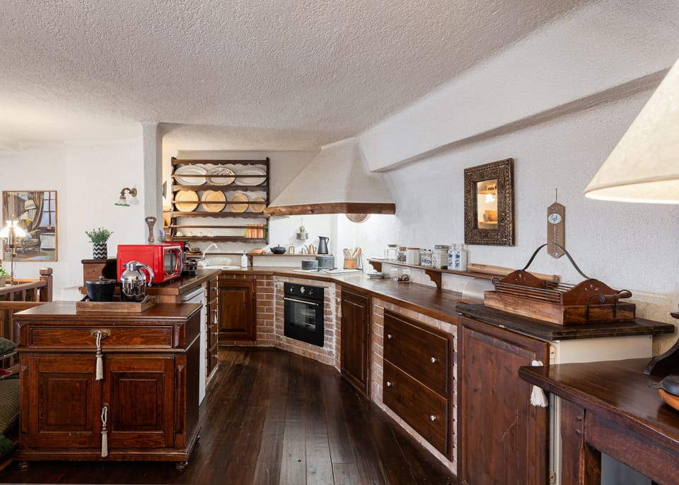 Deluxe Apartment | Private kitchen | Espresso maker, coffee/tea maker, fridge, microwave