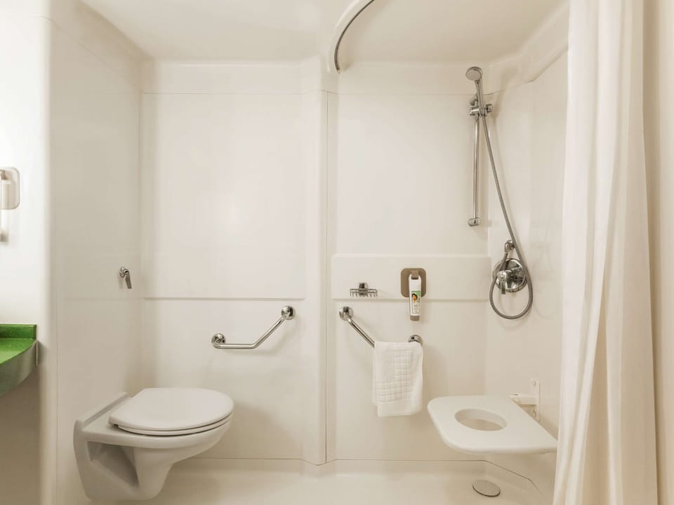 Hypo-allergenic bedding, desk, blackout drapes, iron/ironing board