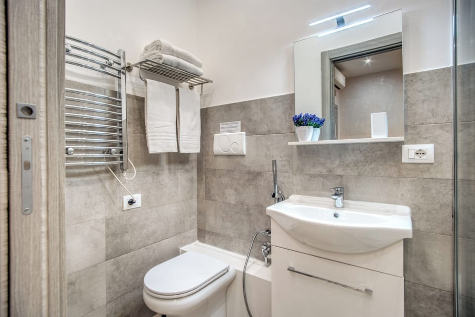 Premium Double Room | Bathroom | Shower, rainfall showerhead, hair dryer, slippers