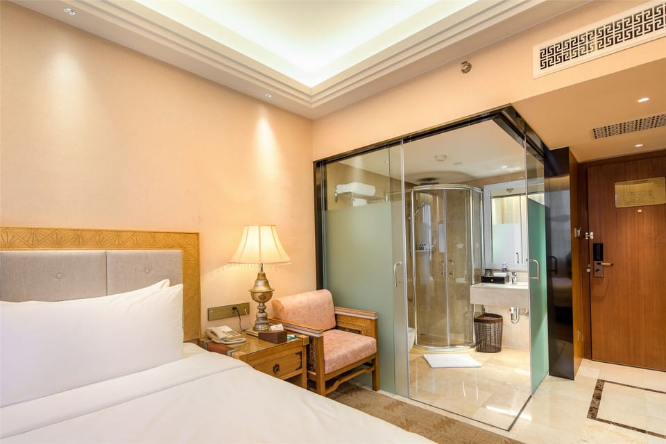 Business Single Room | Down comforters, minibar, in-room safe, desk