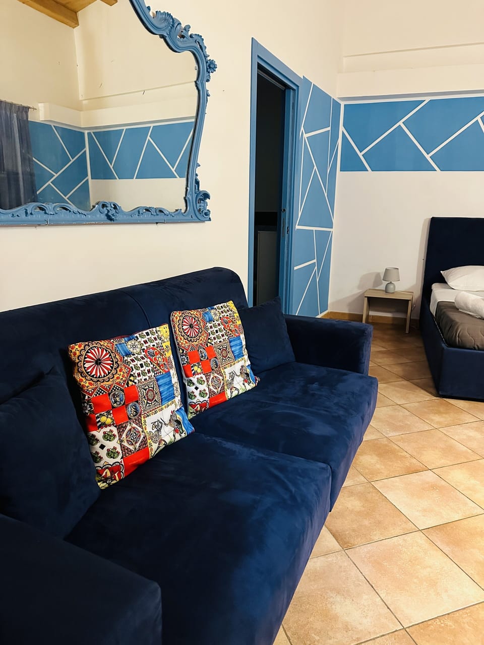 Business Quadruple Room | Living area | 40-inch Smart TV with digital channels