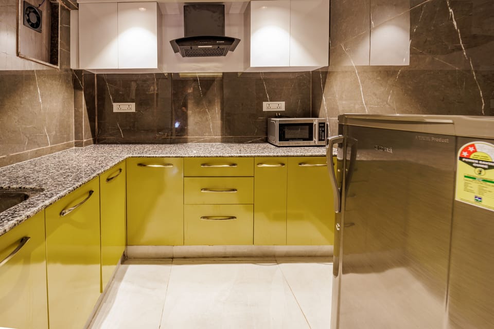 Signature Penthouse | Private kitchen | Coffee/tea maker, electric kettle