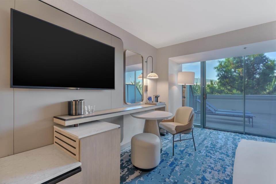 Premium bedding, down comforters, pillowtop beds, in-room safe