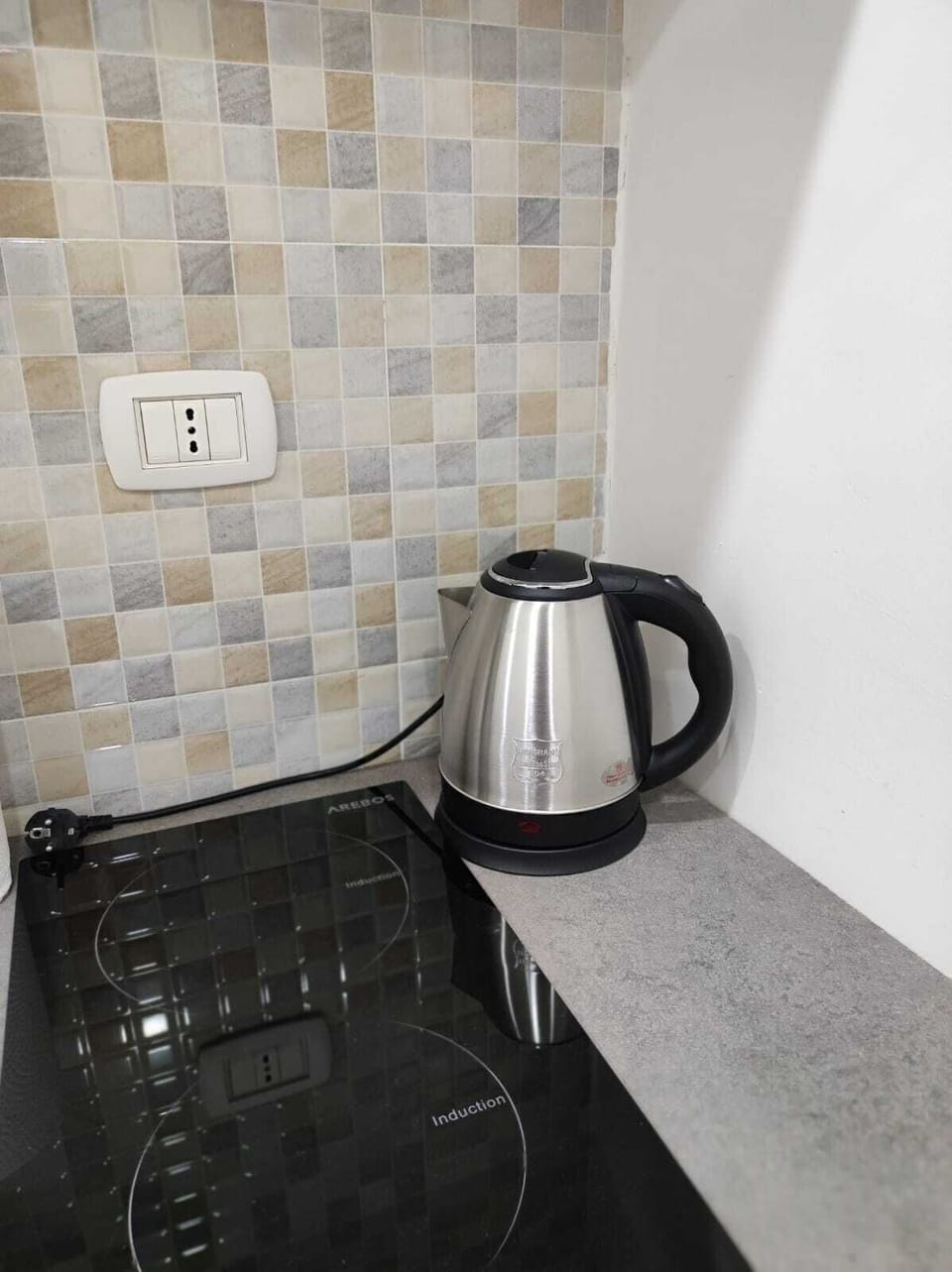 Mini-fridge, stovetop, cookware/dishes/utensils
