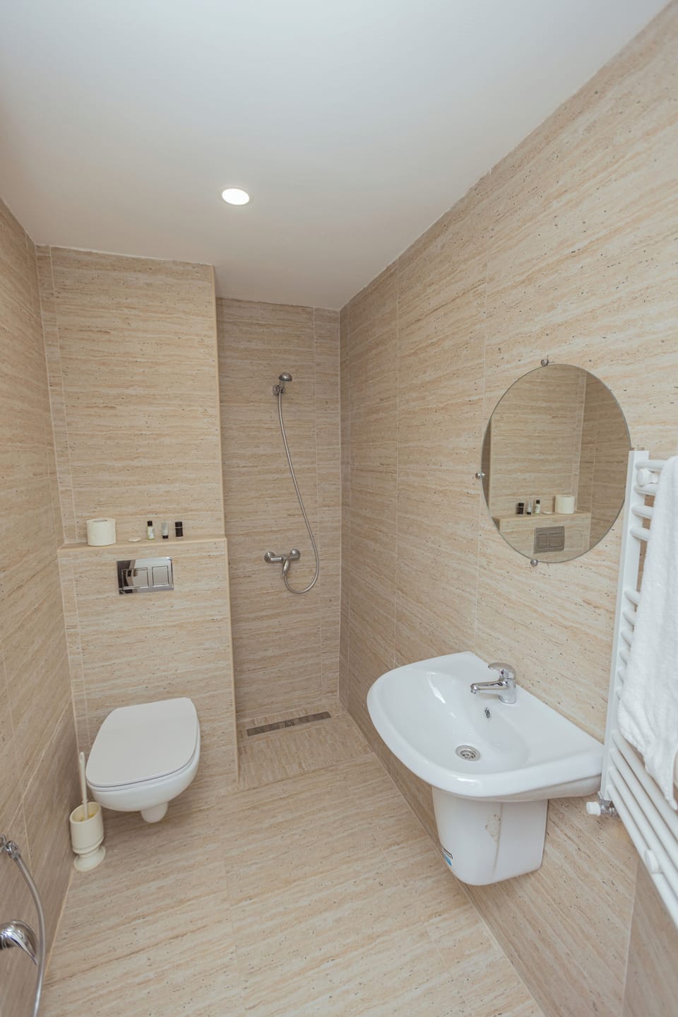 Shower, rainfall showerhead, towels