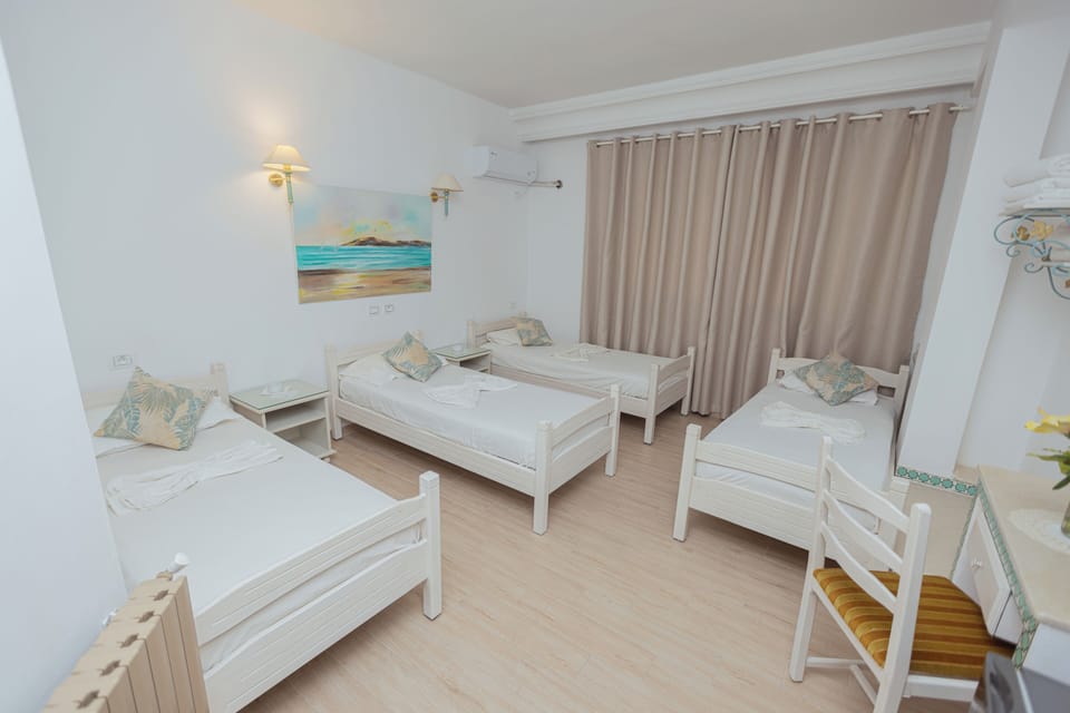 Premium bedding, down comforters, minibar, desk