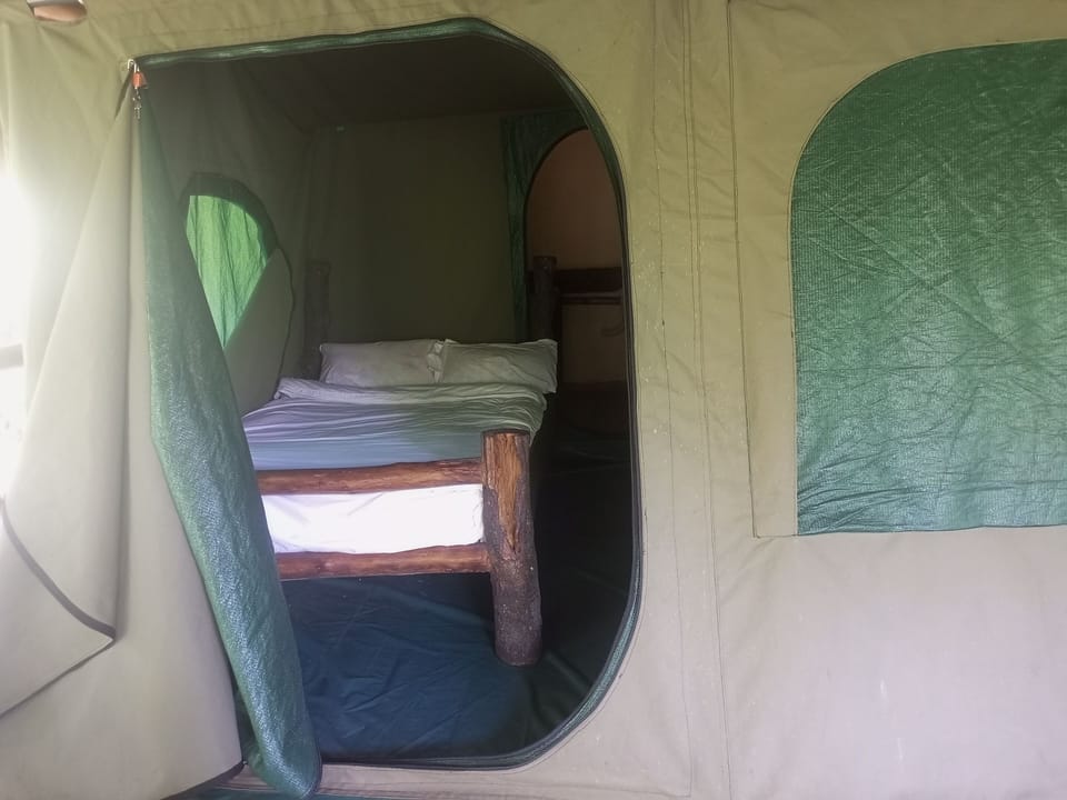 Standard Tent | Desk, laptop workspace, iron/ironing board, bed sheets