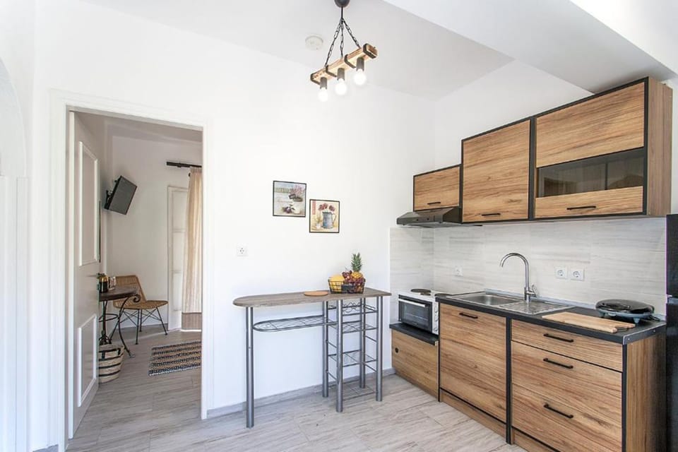 Two-Bedroom Apartment | Private kitchen | Mini-fridge, cookware/dishes/utensils