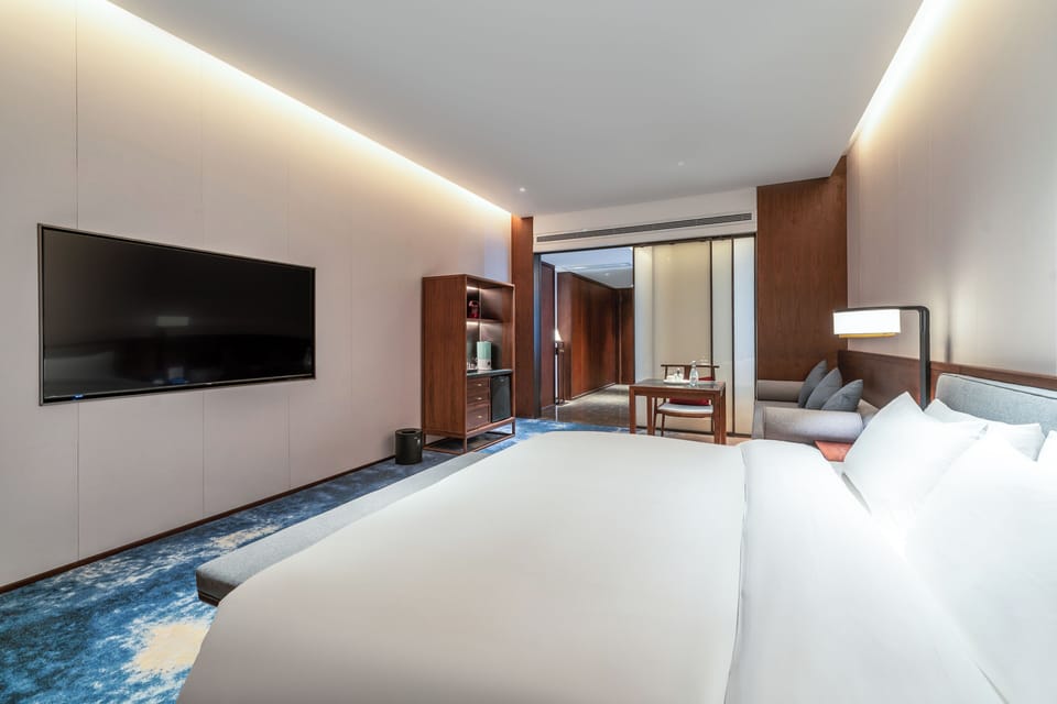 Luxury Room | Down comforters, memory foam beds, minibar (free items), desk