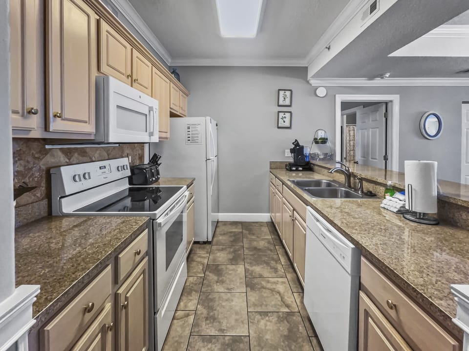 Condo, 4 Bedrooms | Private kitchen | Coffee/tea maker, fridge