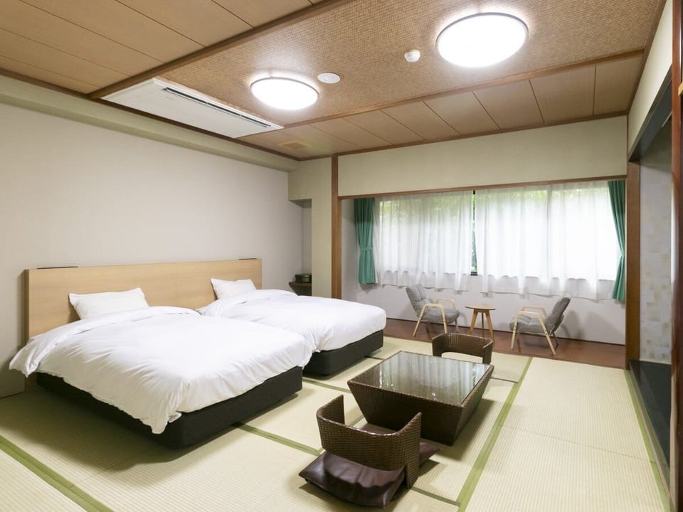 Standard Room B with Japanese-Western style (34 sqm) Non Smoking | Free WiFi, bed sheets
