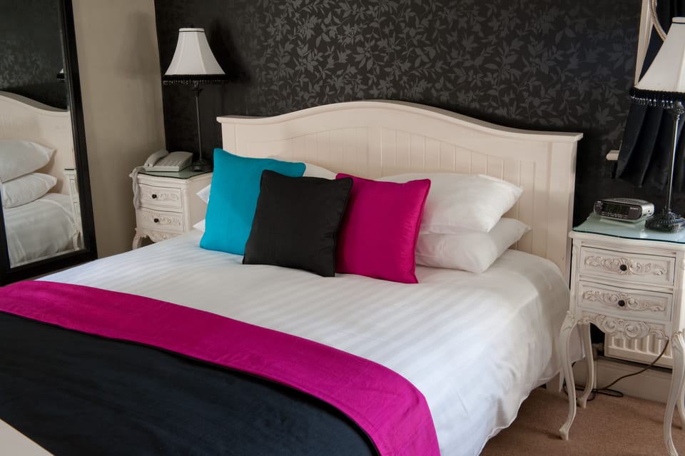Premium bedding, individually furnished, desk, laptop workspace