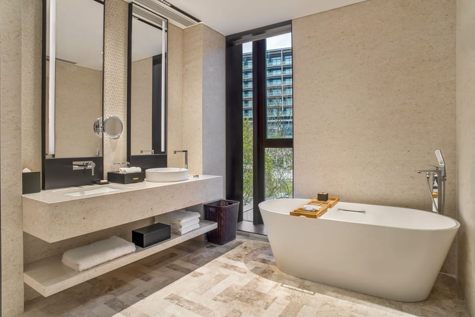 Deluxe Villa, 1 Double Bed | Bathroom | Separate tub and shower, hair dryer, bathrobes, slippers