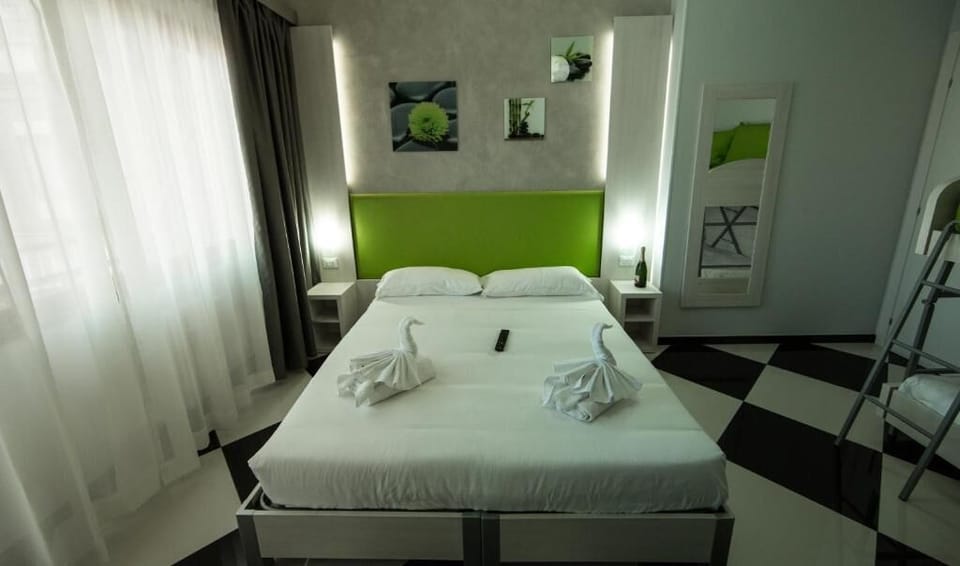 Economy Triple Room, Garden View | Hypo-allergenic bedding, down comforters, minibar, in-room safe