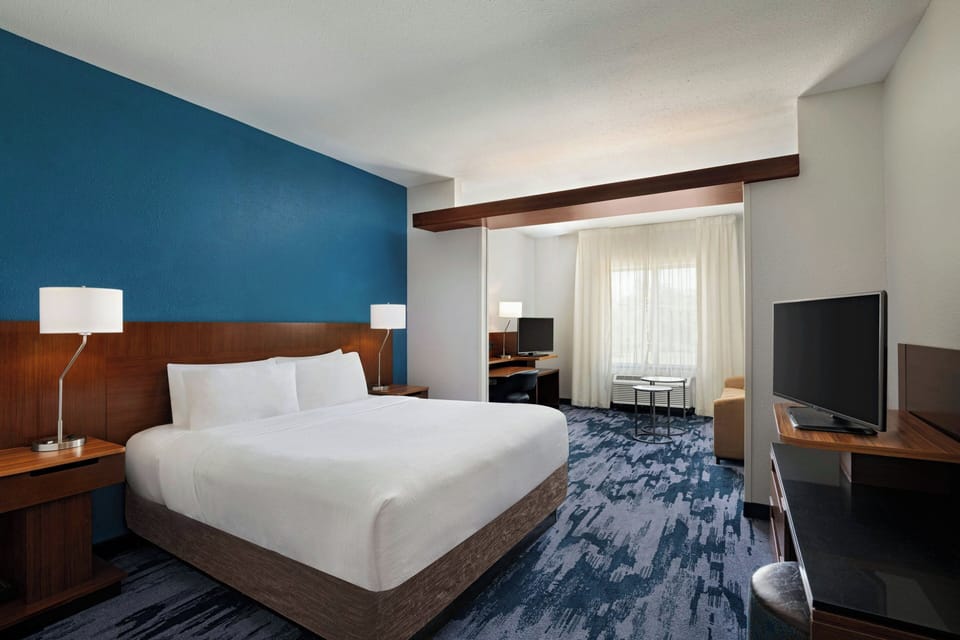 Room, 1 King Bed with Sofa bed | Living room | 32-inch LCD TV with cable channels, TV, pay movies