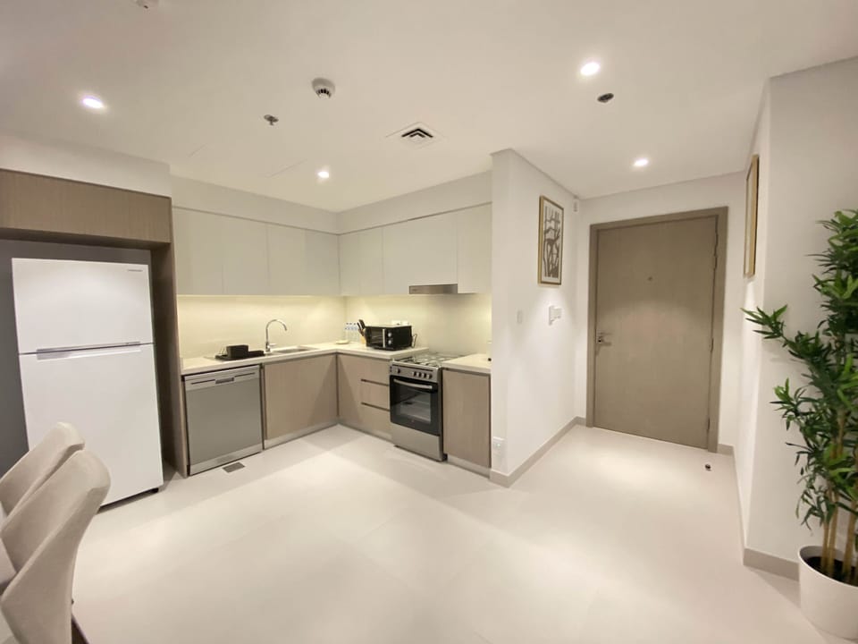 Panoramic Apartment | Private kitchen | Full-size fridge, microwave, oven, stovetop