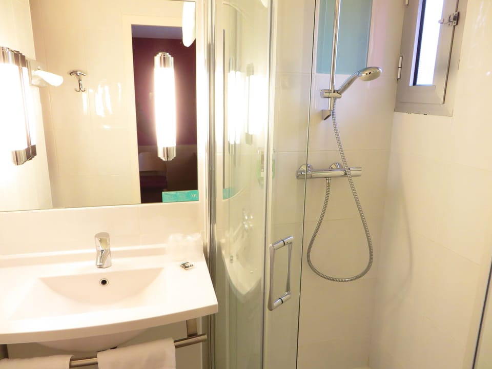 Eco-friendly toiletries, hair dryer, towels