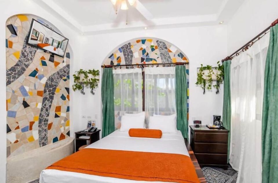 Jungle Room | Premium bedding, in-room safe, individually decorated