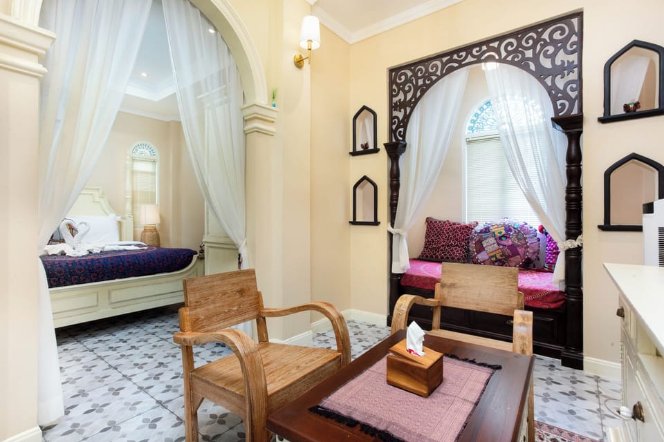Executive Room, 1 King Bed (with Air Purifier) | Living area | 40-inch Smart TV with cable channels, toys