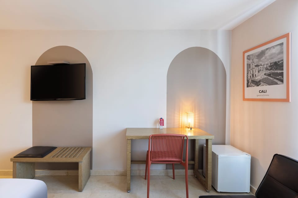 Select Comfort beds, minibar, in-room safe, desk