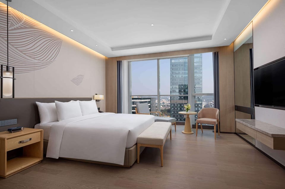 Superior Suite, 1 King Bed, Non Smoking | Minibar, in-room safe, blackout drapes, iron/ironing board