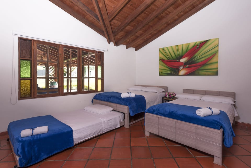 Habitacion Quimbaya | Egyptian cotton sheets, premium bedding, down comforters