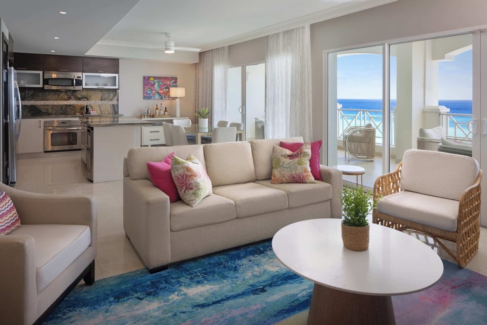 Luxury Penthouse, 2 Bedrooms, Oceanfront | Living area | 32-inch flat-screen TV with cable channels, TV, iPod dock