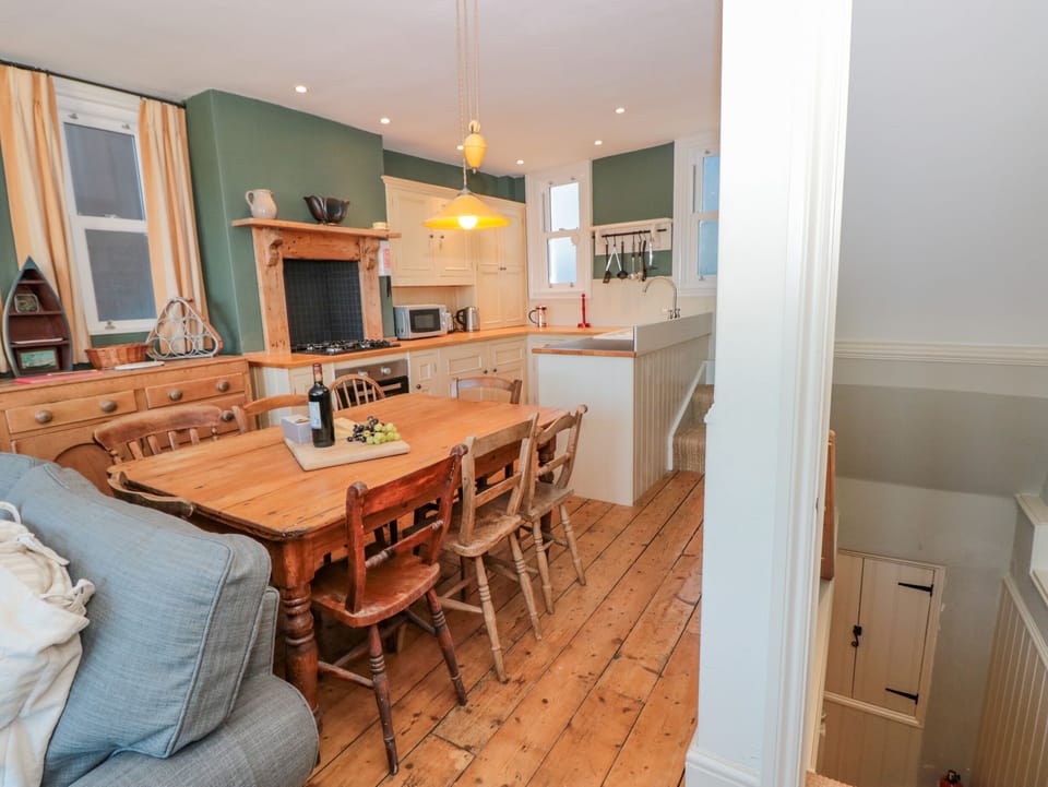 Fridge, electric kettle, toaster, cookware/dishes/utensils