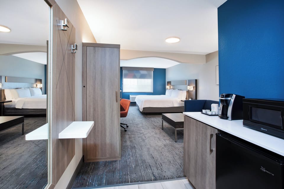 Suite, 1 King Bed with Sofa bed | In-room safe, desk, iron/ironing board, free cribs/infant beds