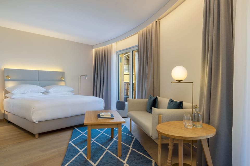 Hypo-allergenic bedding available, down comforters, minibar