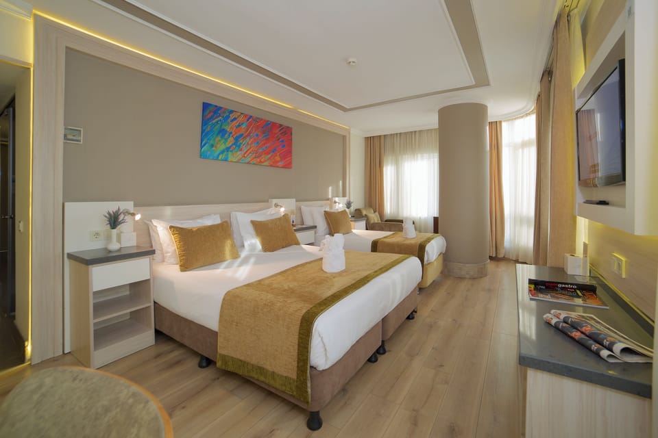 Family Room | Frette Italian sheets, premium bedding, minibar, in-room safe