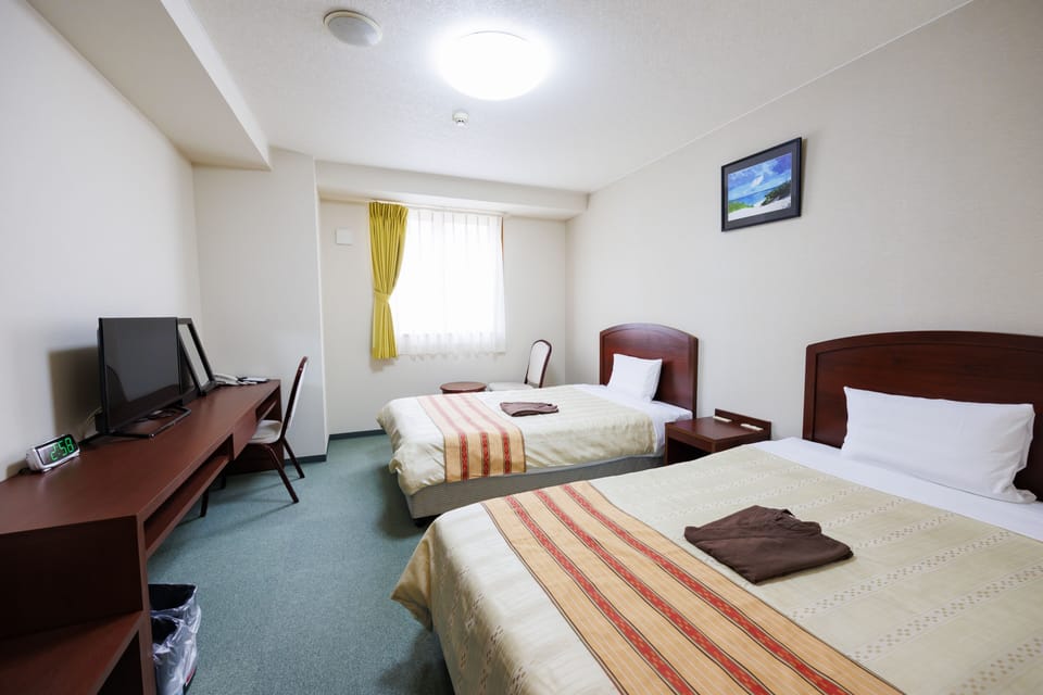 Twin Room, Non Smoking | Free WiFi, bed sheets